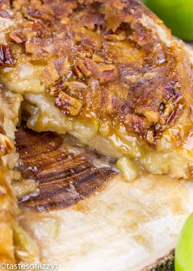 Upside Down Apple Dumpling Pie is a delicious cross between apple dumplings and apple pie! The best apple recipe for fall! Apple dumpling pie dessert with a slice removed from it