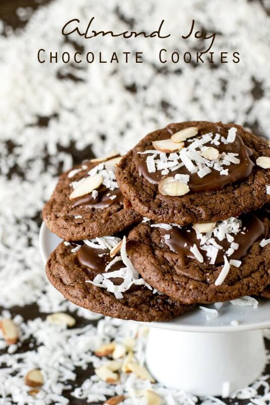 Bake these Almond Joy Chocolate Cookies for the coconut lover in your life. The cookies are fudgy with chopped Mounds bars inside and chocolate, coconut and almonds on top.