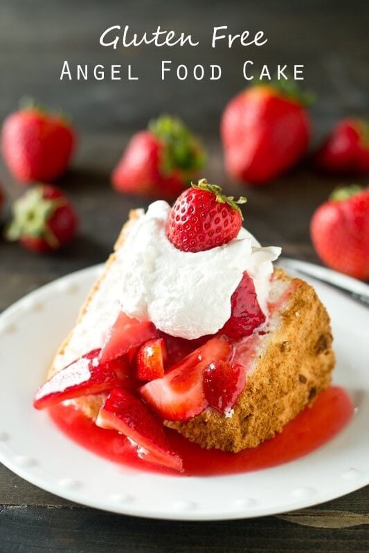 Gluten Free Angel Food Cake | Tastes of Lizzy T Gluten Free Angel Food Cake topped with strawberries and whipped cream