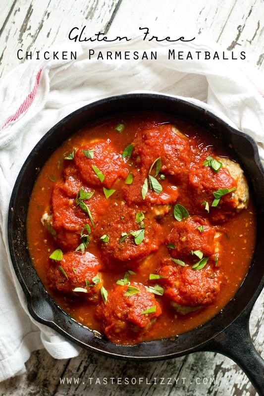 Get the classic chicken parmigiana flavor in Chicken Parmesan Meatballs. Made gluten free and sugar free for a high protein, healthy dinner. titled image (and shown): gluten free chicken Parmesan meatballs (simmering in a cast iron skillet)
