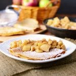 Whole wheat apple crepes stuffed with vanilla yogurt crepe filling and topped with cinnamon apples