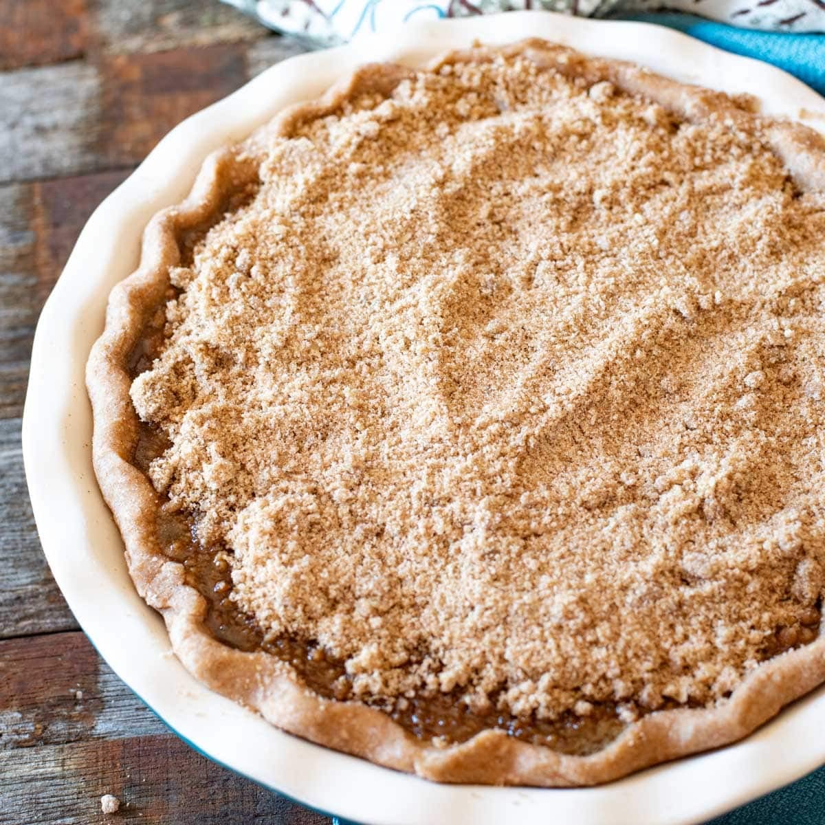 unbaked molasses pie with crumbs on top