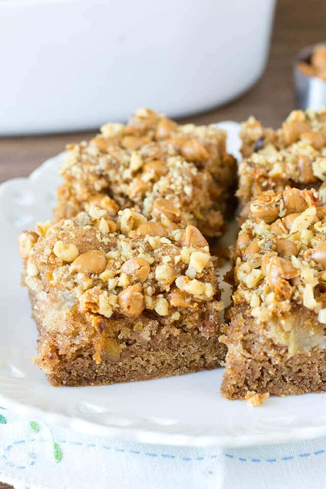 Apple Butterscotch Snack Cake is one of our best apple recipes for a special fall treat. The flavors of moist apple cake and butterscotch pair perfectly! squares of apple butterscotch snack cake