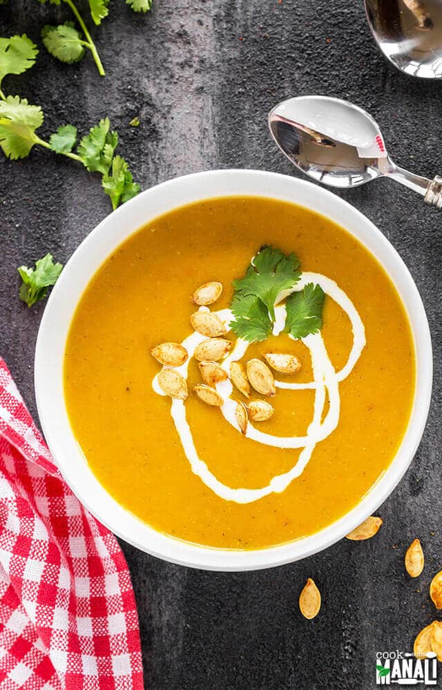 Vegan Pumpkin Apple Carrot Soup bowl of creamy vegan soup made with pumpkin, carrots and apples