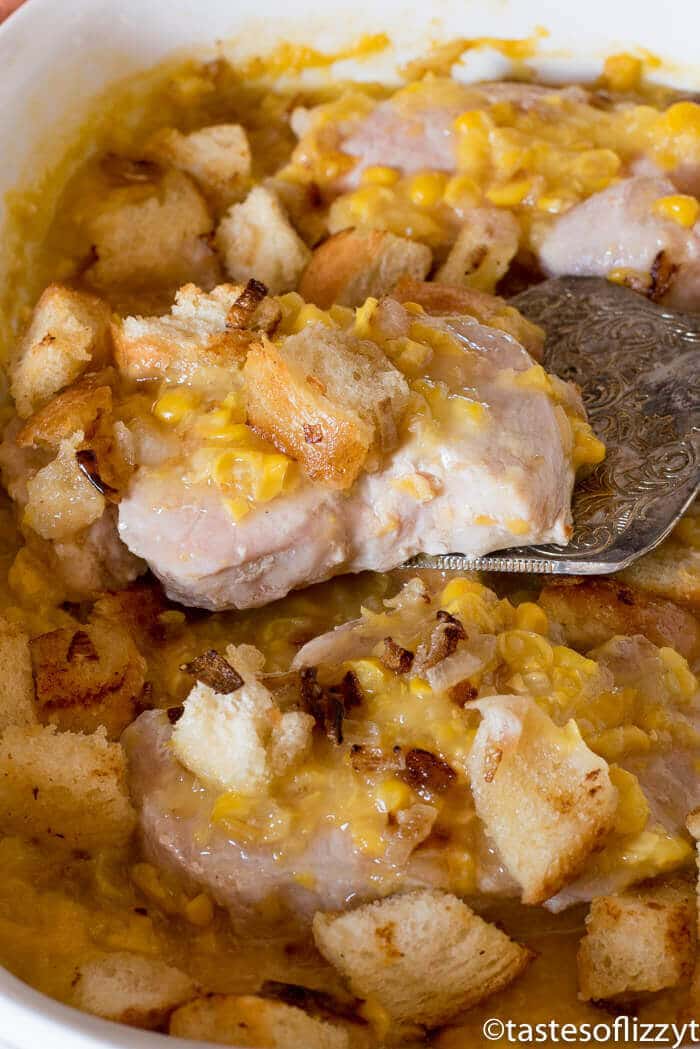 Cream Corn Pork Chops Casserole This is one of the best pork chop recipes for a quick weeknight dinner! #porkchops #porkrecipe #casserole #easydinners buttery toasted bread crumbs on top of creamed corn casserole with pork chops