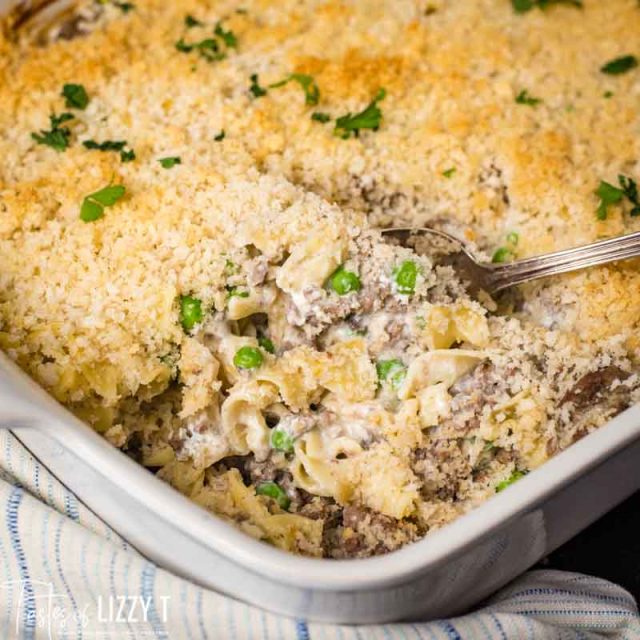 A dish is filled with beef and pasta casserole