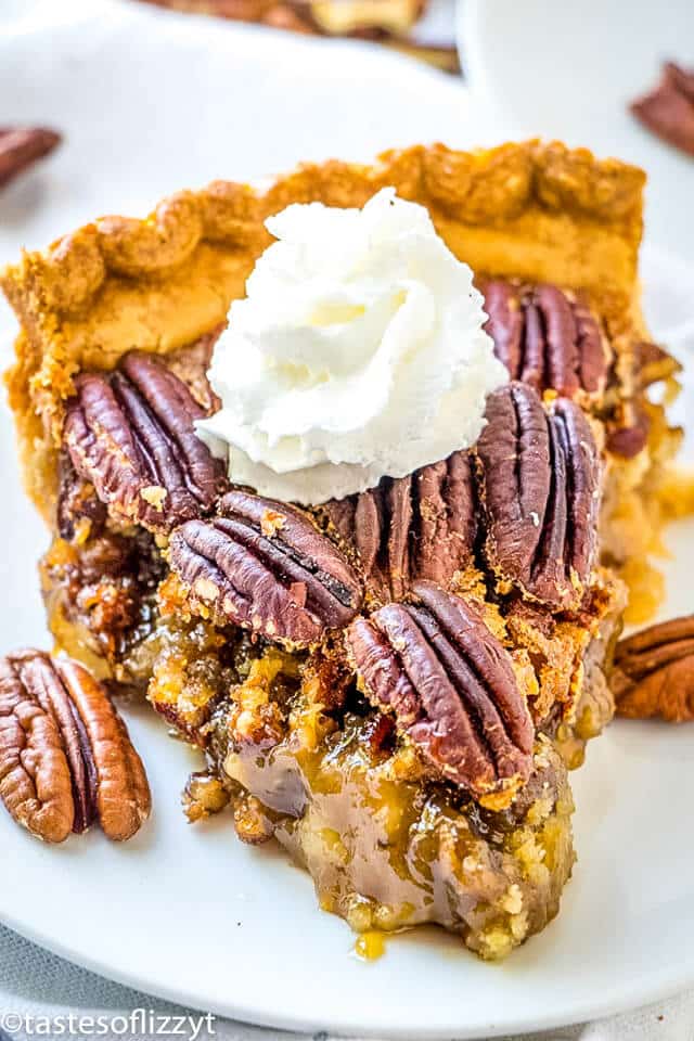 A piece of pecan pie on a plate