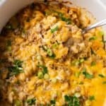 overhead view of slow cooker hamburger helper with a spoon