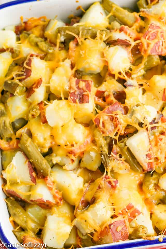 A close up of food, with Potato and green beans