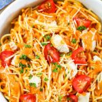 Roasted Pepper Pasta Sauce with shredded cheese and tomatoes
