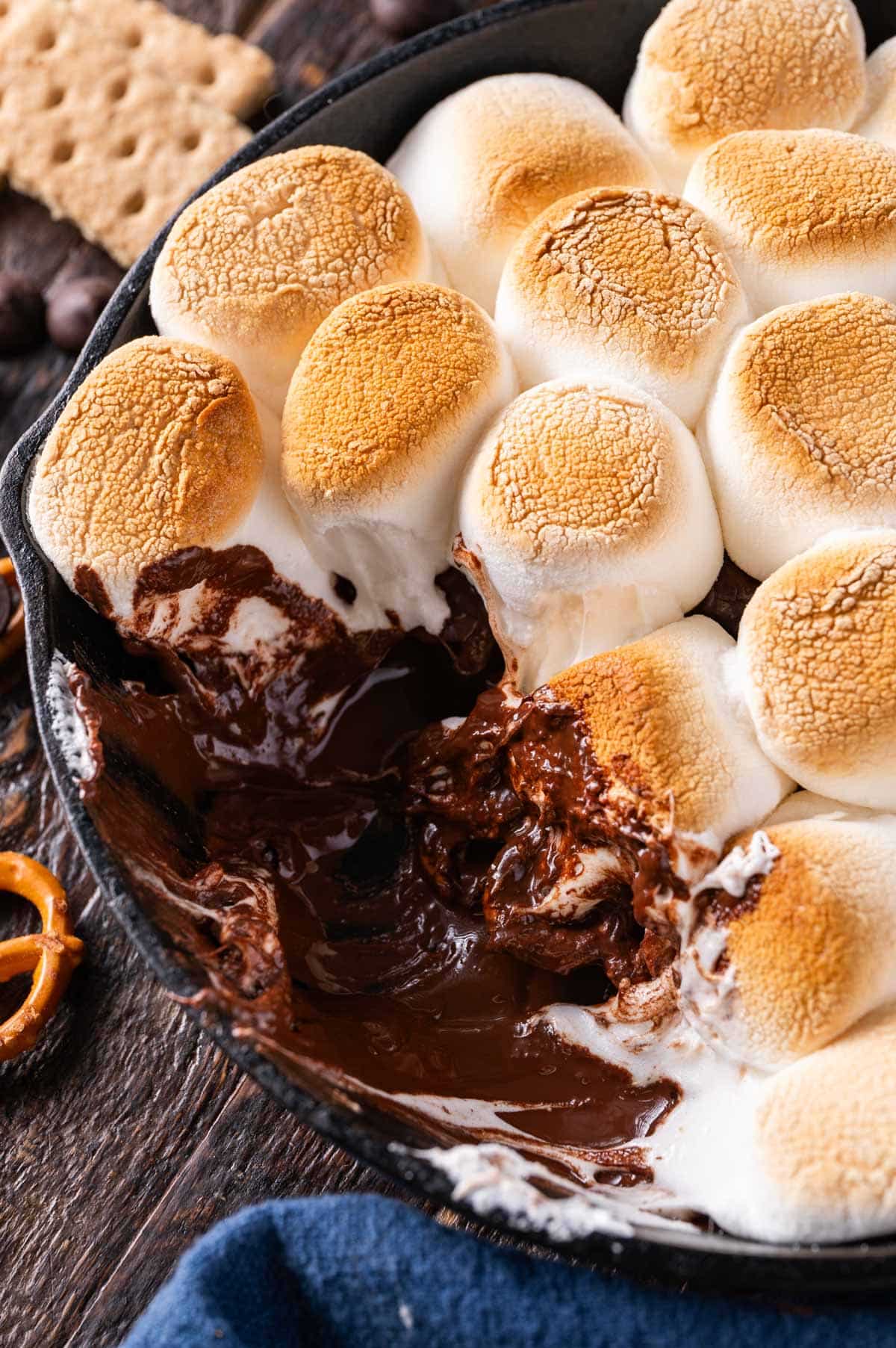 closeup of melted chocolate with toasted marshmallows on top