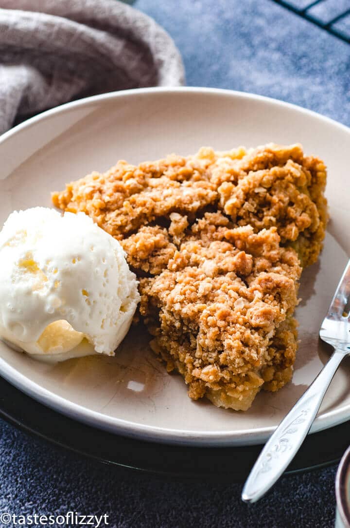 slice of pie with ice cream on a plate