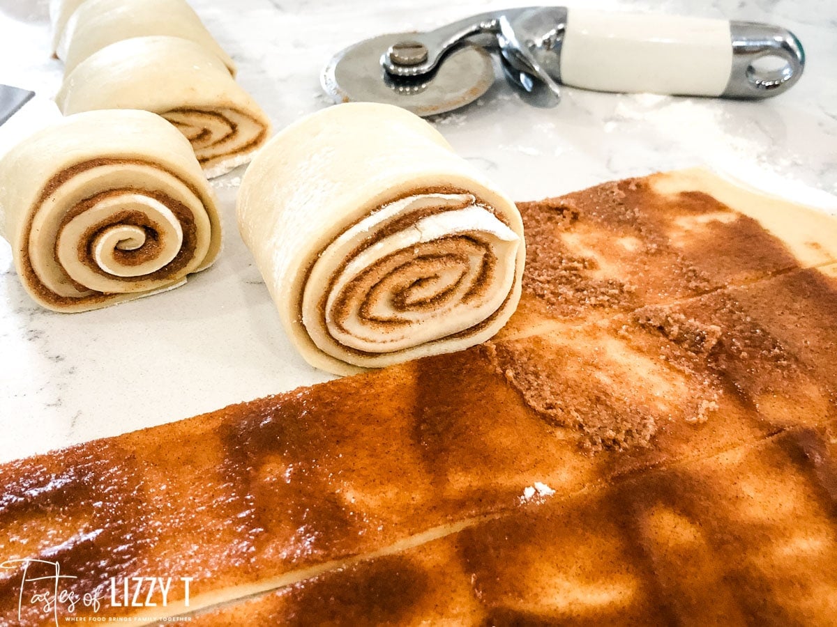 rolling cinnamon rolls