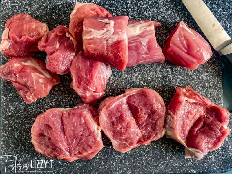 A close up of uncooked sliced pork tenderloin