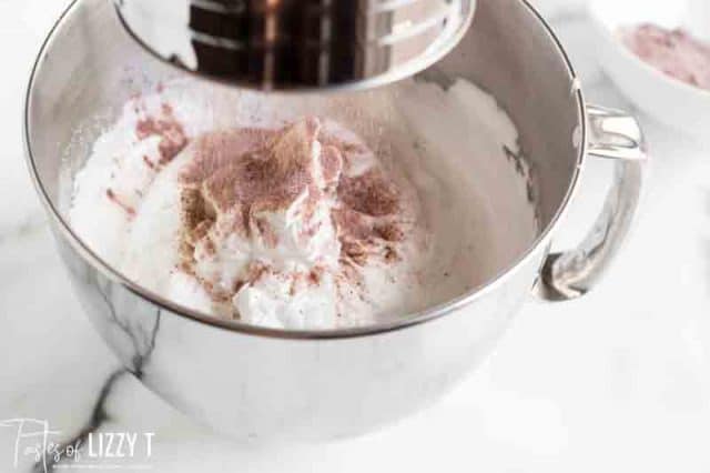 cocoa powder over whipped egg whites