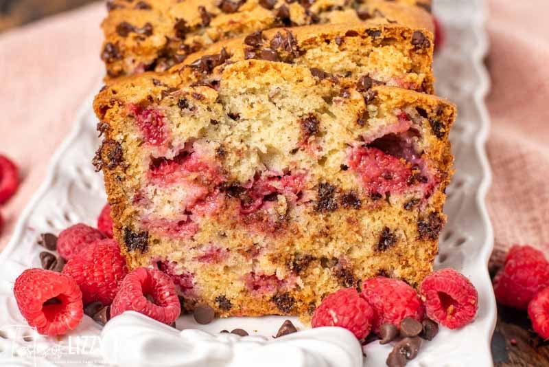 slice of chocolate chip raspberry bread on a plate