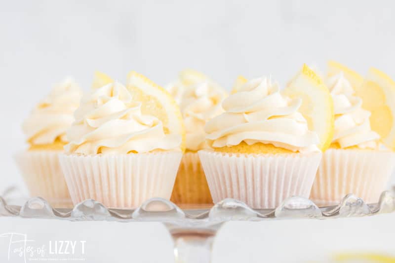 fresh lemon cupcakes on a cake stand