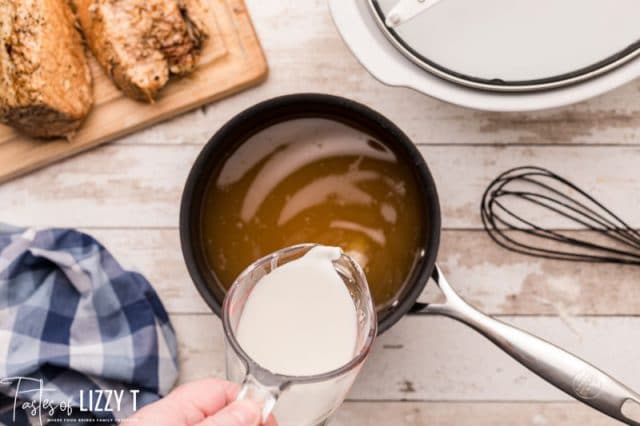 cornstarch slurry pouring in pork drippings