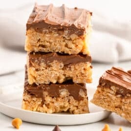 a stack of 3 rice krispie scotcheroos on a plate