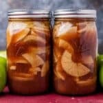 two mason jars of apple pie flling