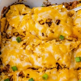 closeup of melted cheese on easy enchilada casserole