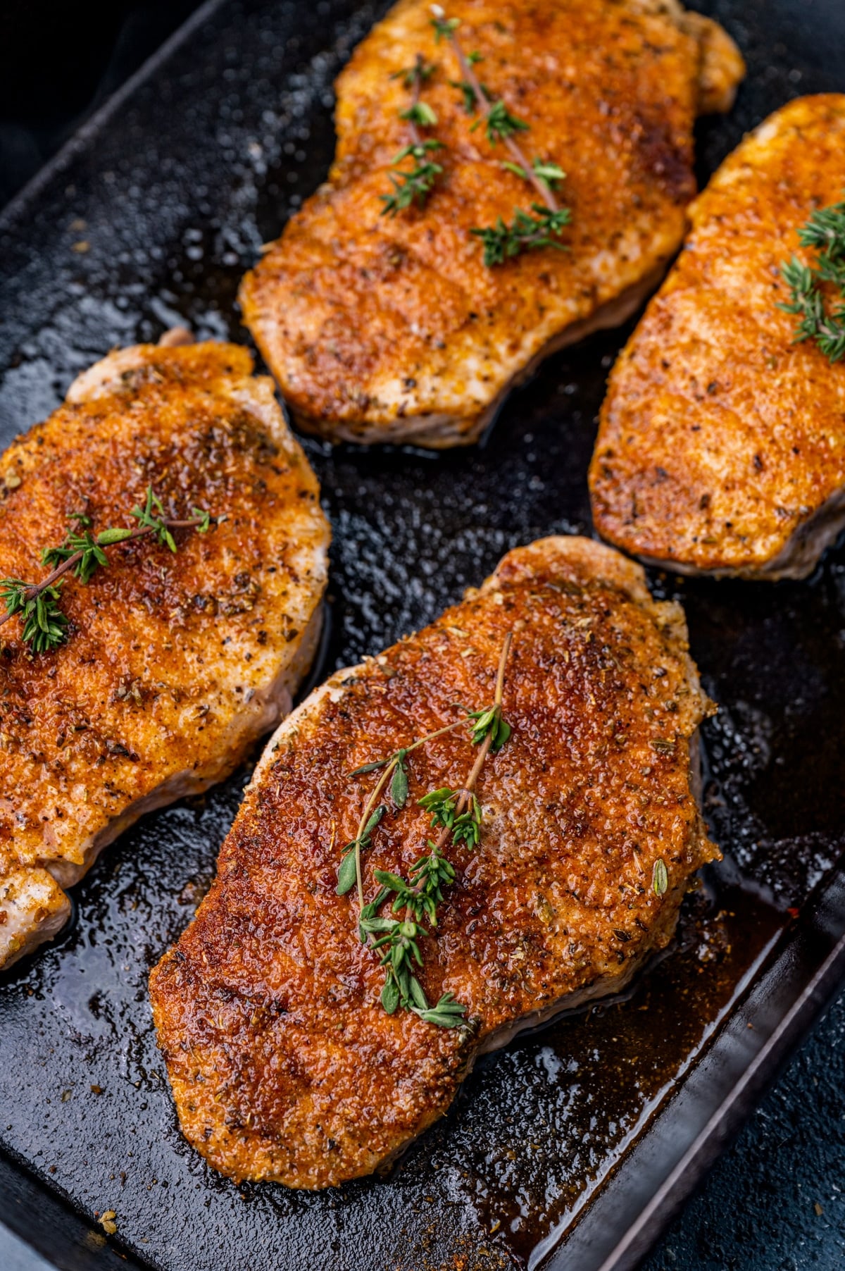 oven baked pork chops in a skillet