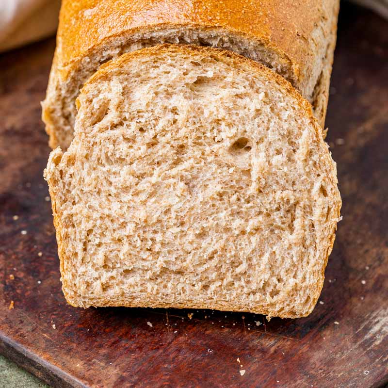 closeup of a slice of whole wheat sourdough bread