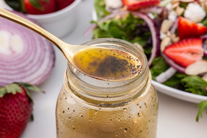 poppy seed dressing on a spoon