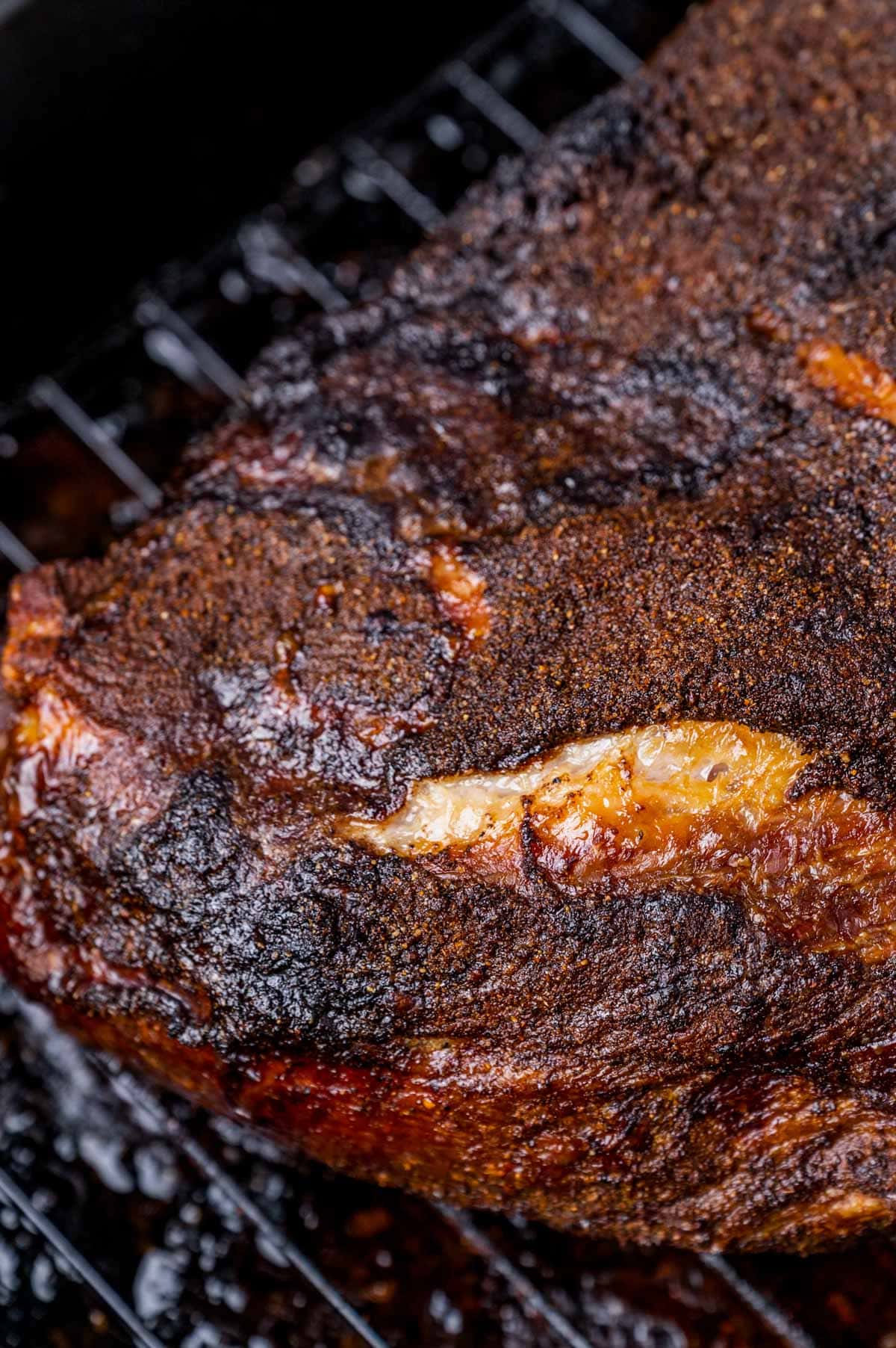 oven baked crispy pork shoulder on a rack