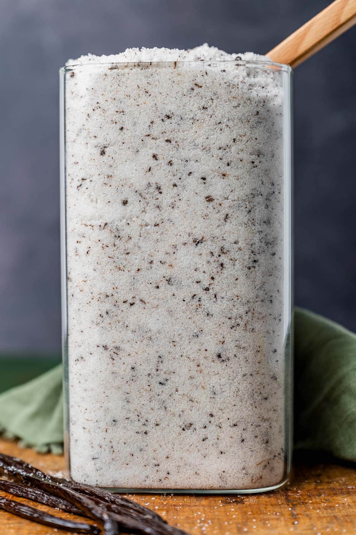 a tall glass canister of vanilla sugar