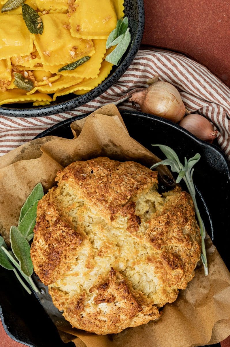 overhead view of irish soda bread with butternut squash in a bowl