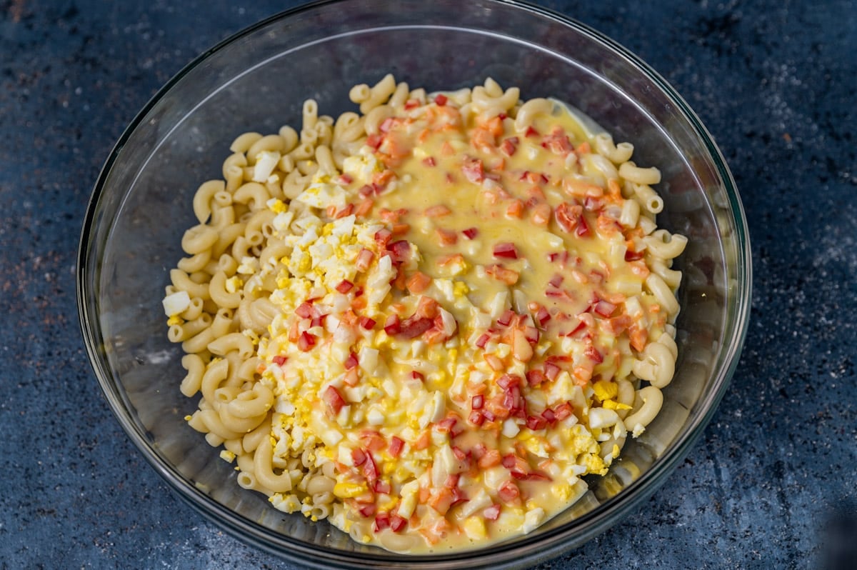 macaroni salad ingredients in a bowl, unmixed
