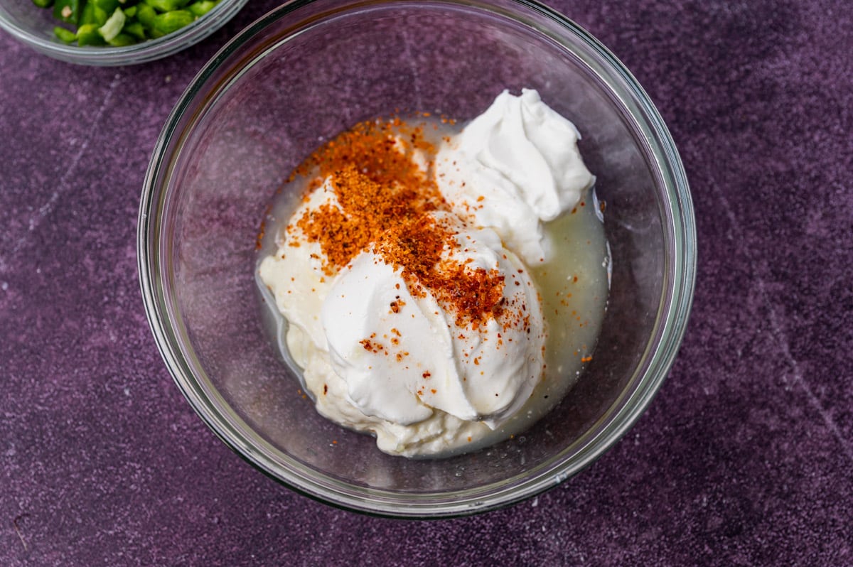 dressing for street corn pasta salad in a bowl