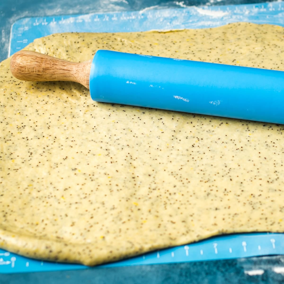 rolling pin on lemon poppy seed dough