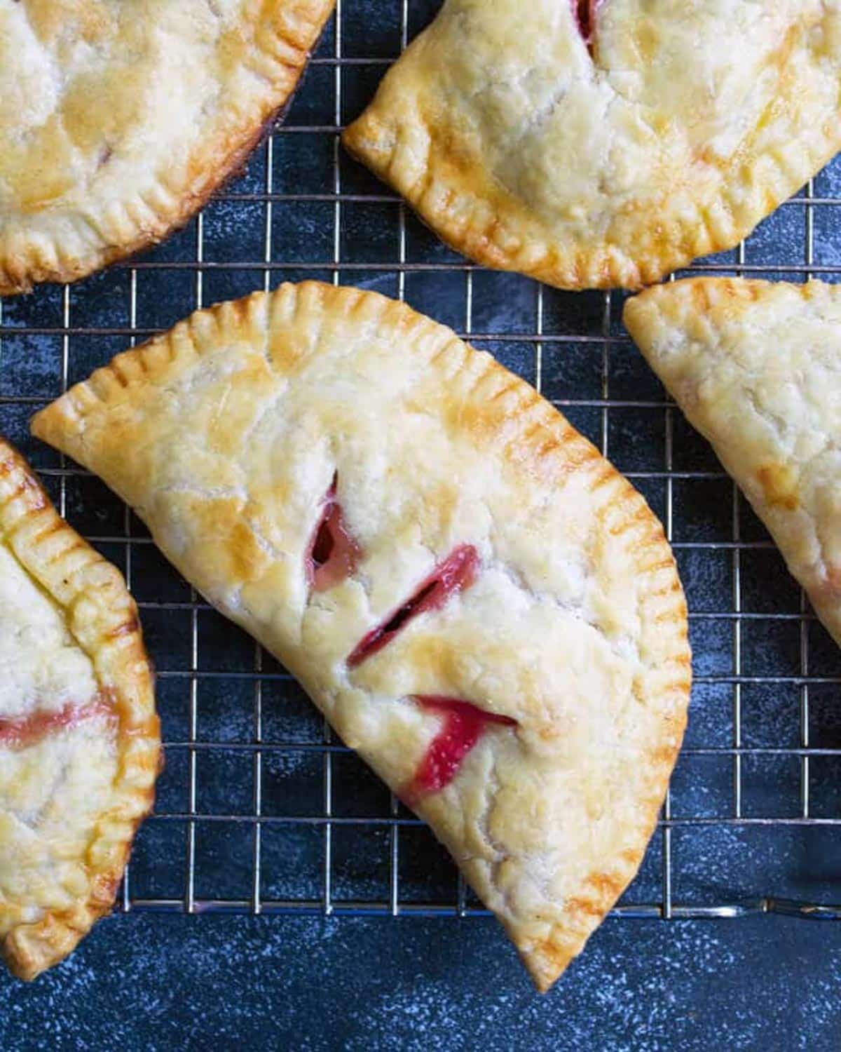 overhead view of a plum turnover on a wire rack