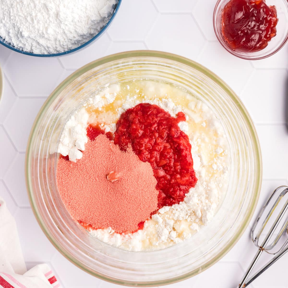 ingredients for strawberry cupcakes in a mixing bowl, unmixed