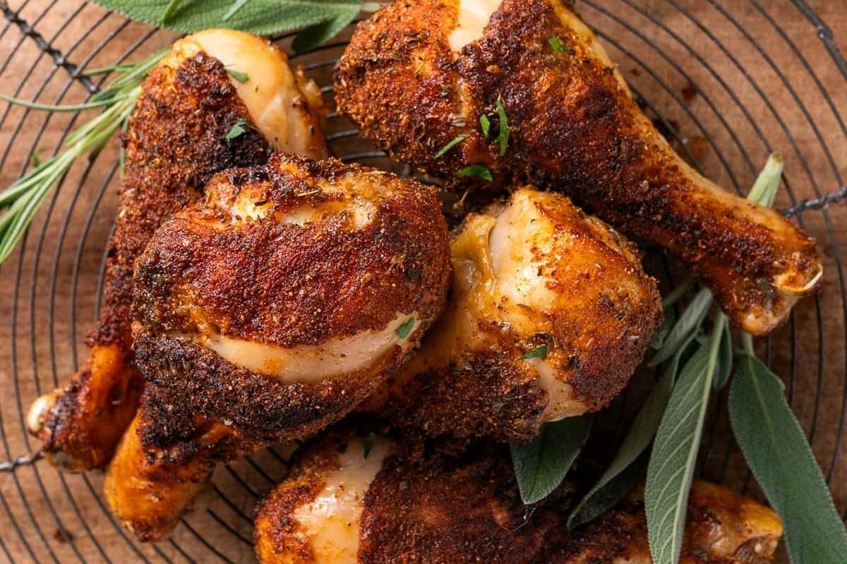 baked chicken legs on a wire rack