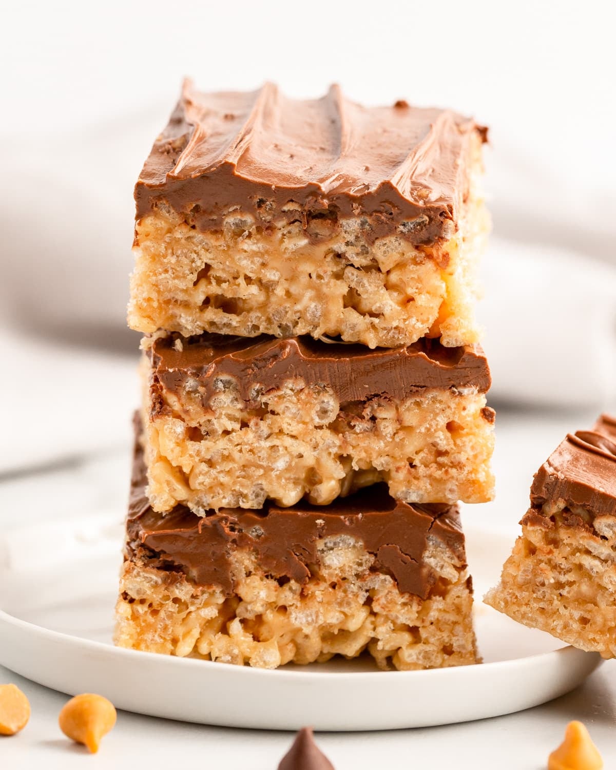 a stack of scotcheroos on a plate