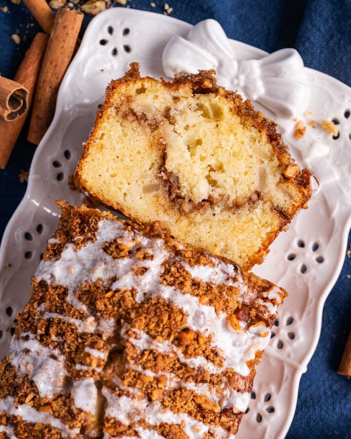 overhead view of apple streusel bread with two slices cut