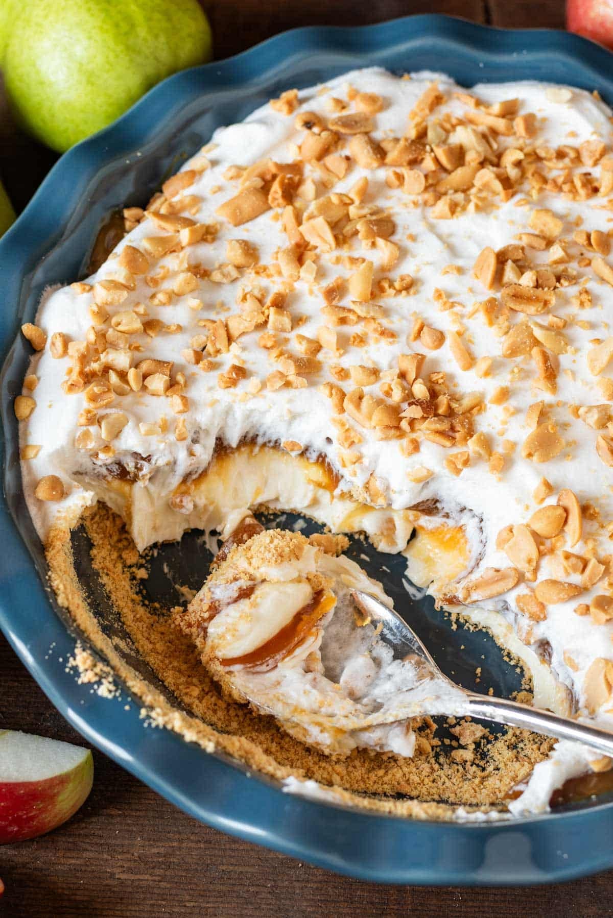 overhead view of a cheesecake dip with caramel