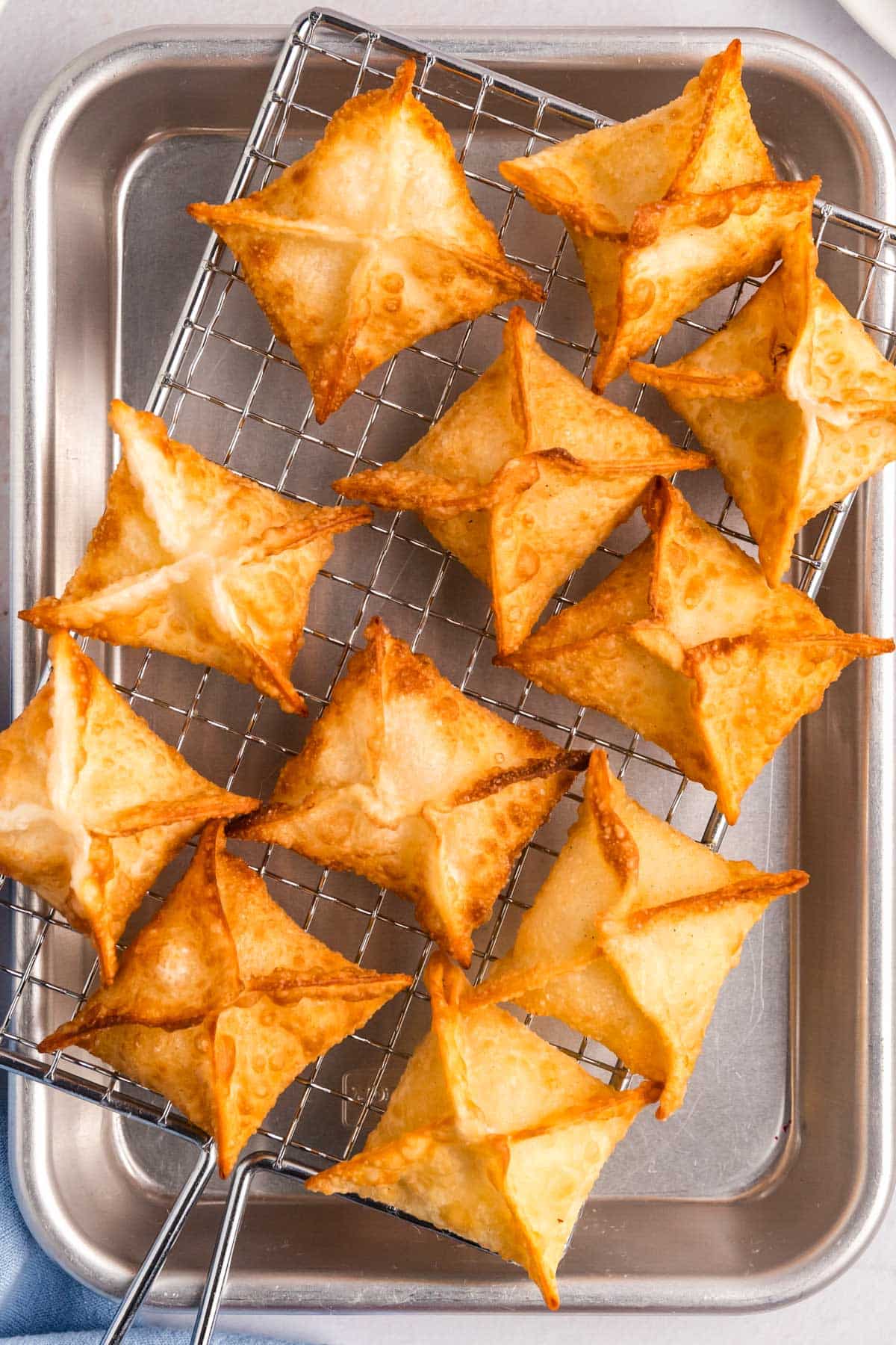crab rangoon on a wire rack