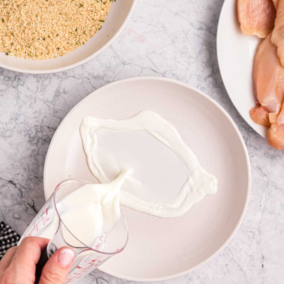 milk pouring in a bowl