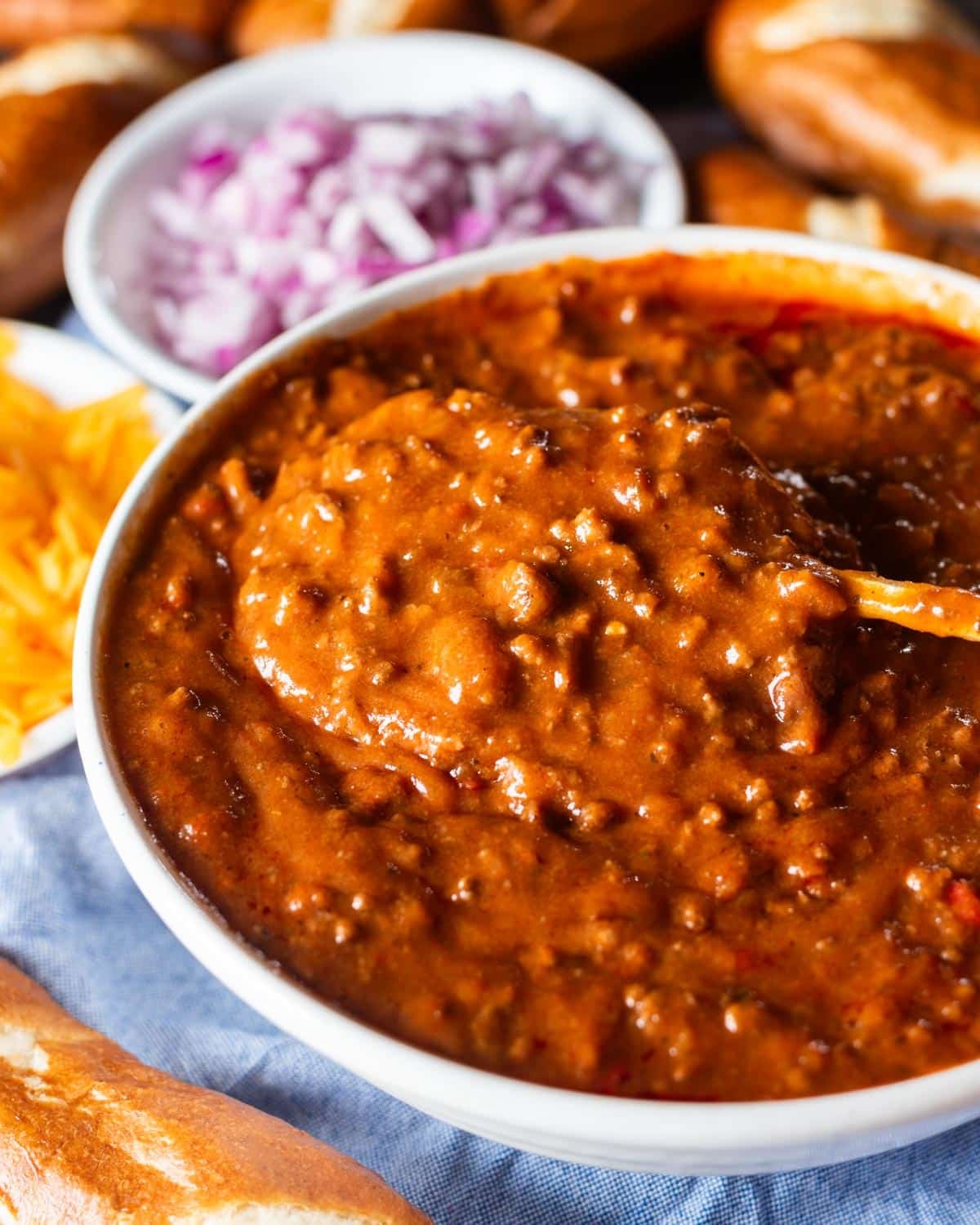 a bowl of hot dog chili sauce