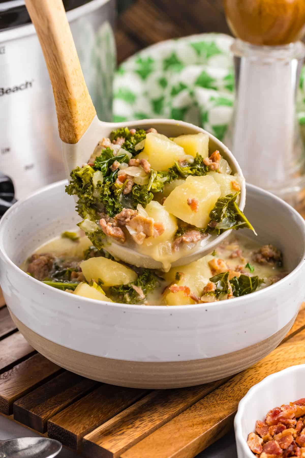 ladeling soup into a bowl