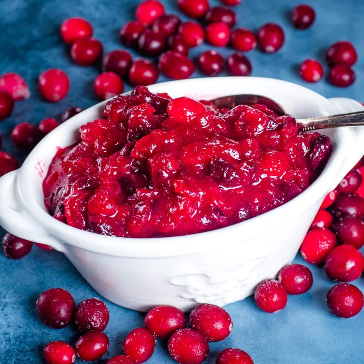 fresh cranberry sauce in a bowl with a spoon