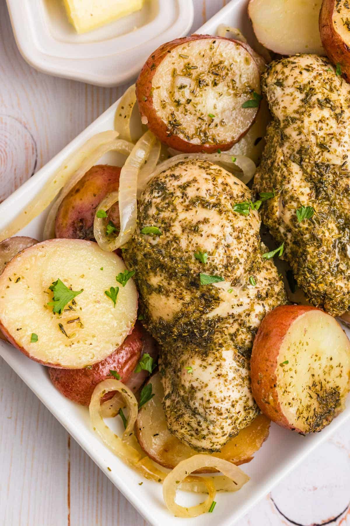 seasoned potatoes and chicken on a plate