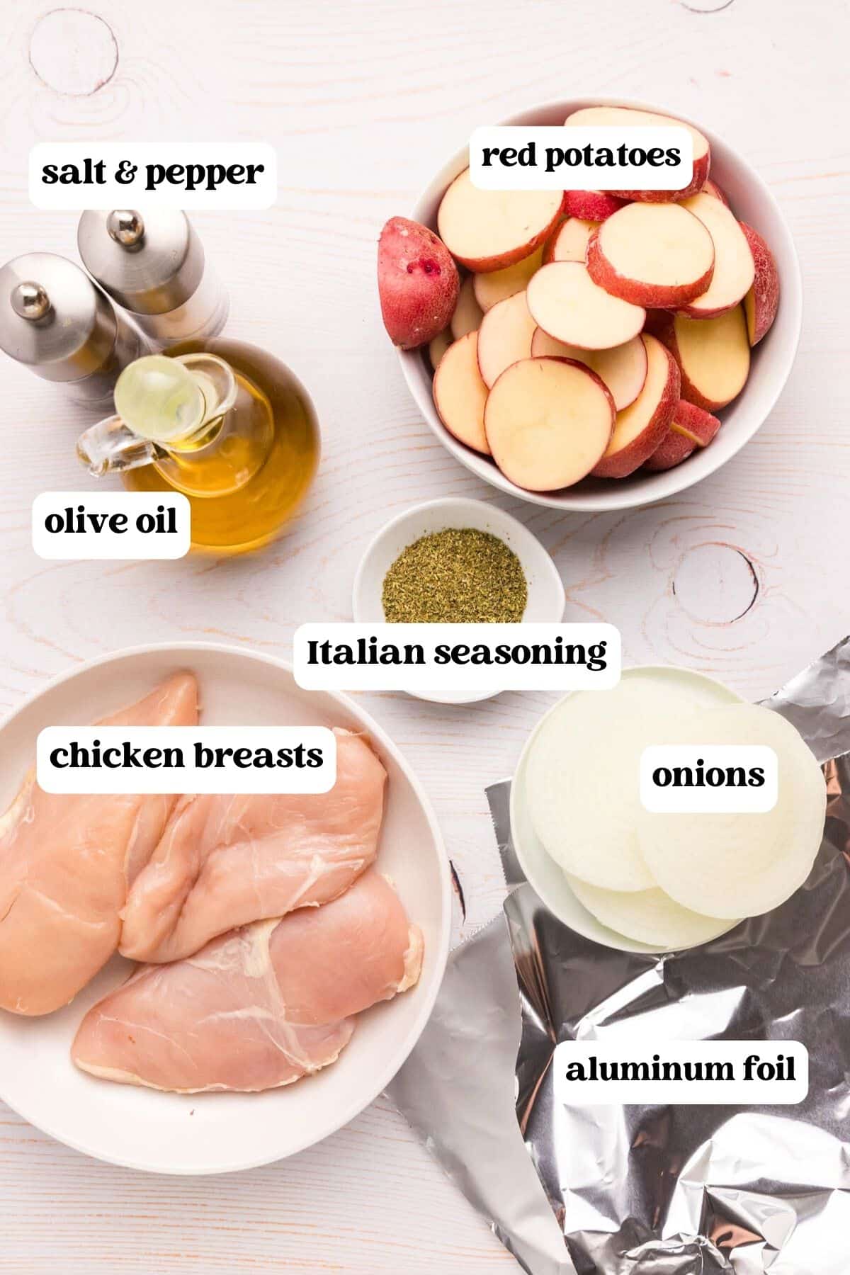 ingredients for chicken potato foil packets on a table