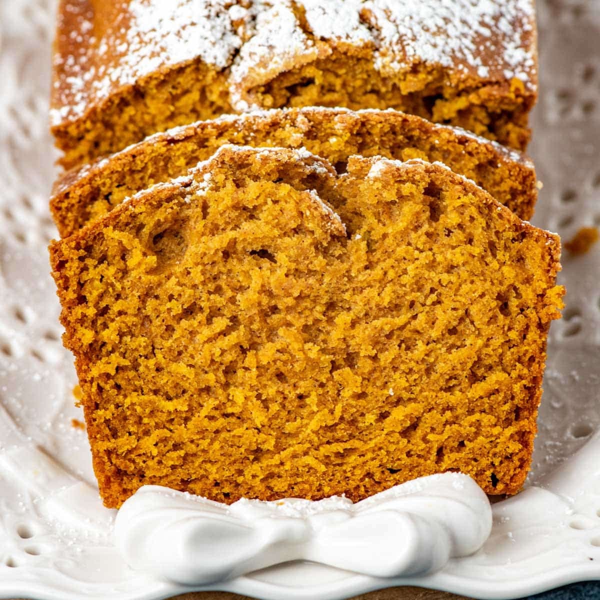 closeup of pumpkin bread slices on a plate