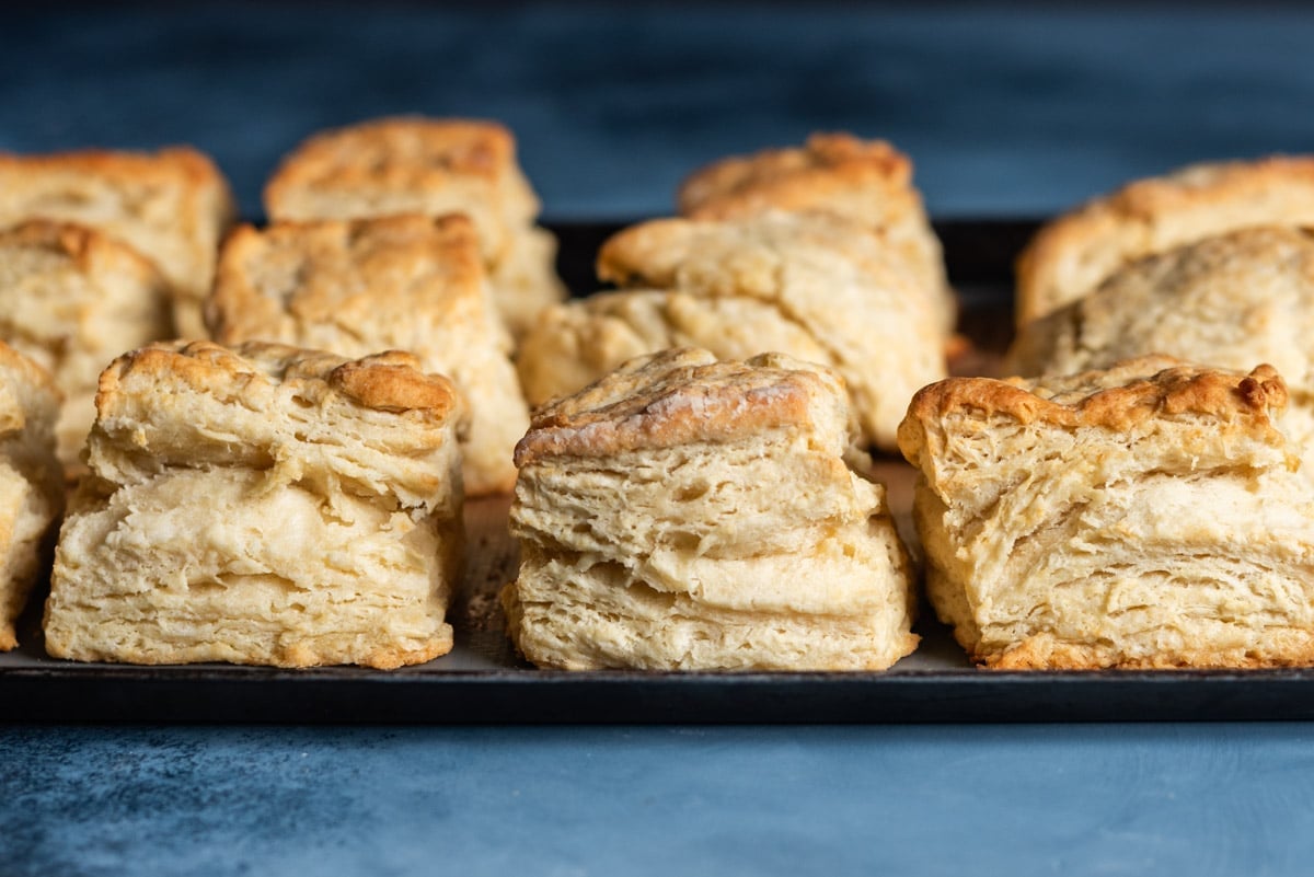 flaky biscuits on a baking sheet