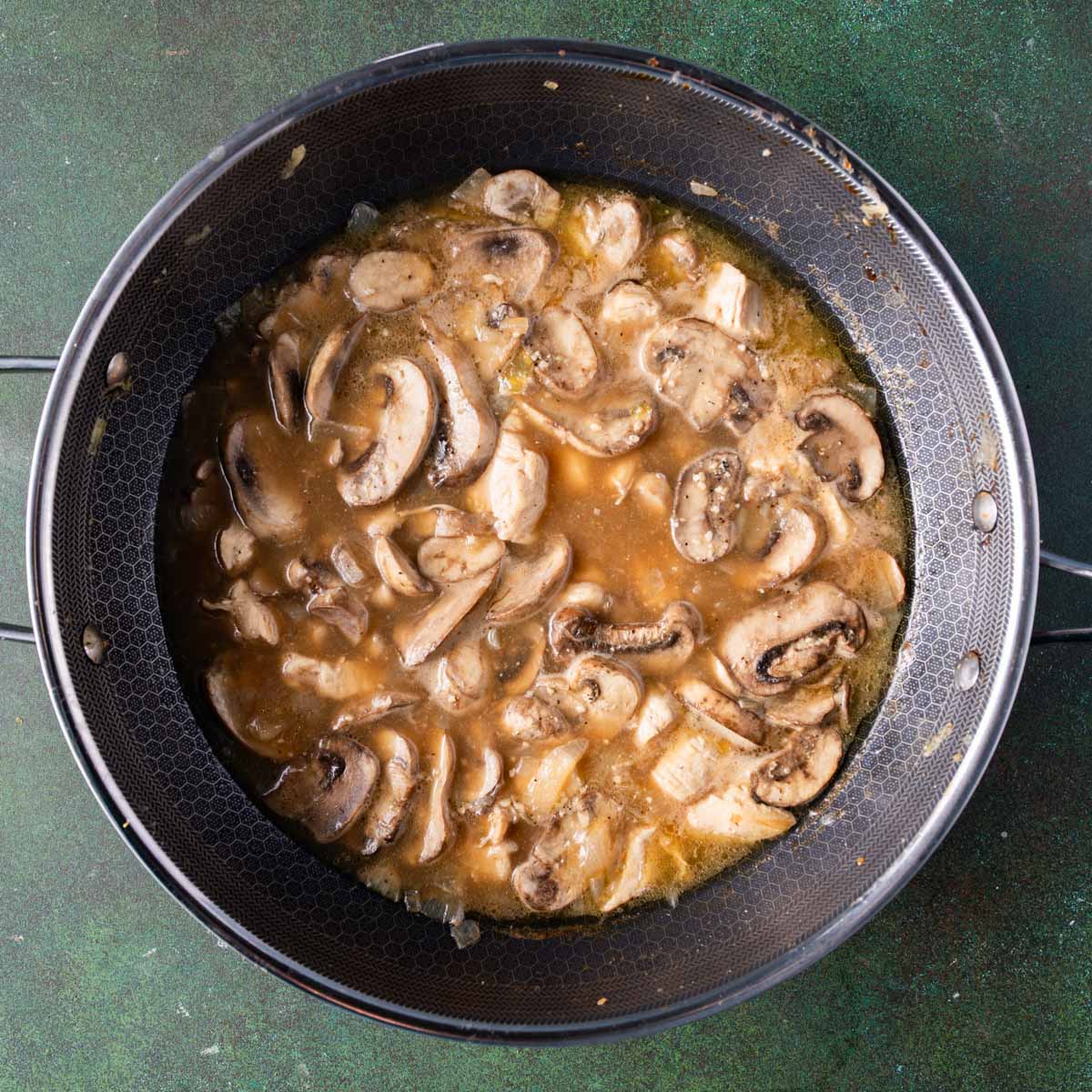 mushrooms and chicken in chicken broth